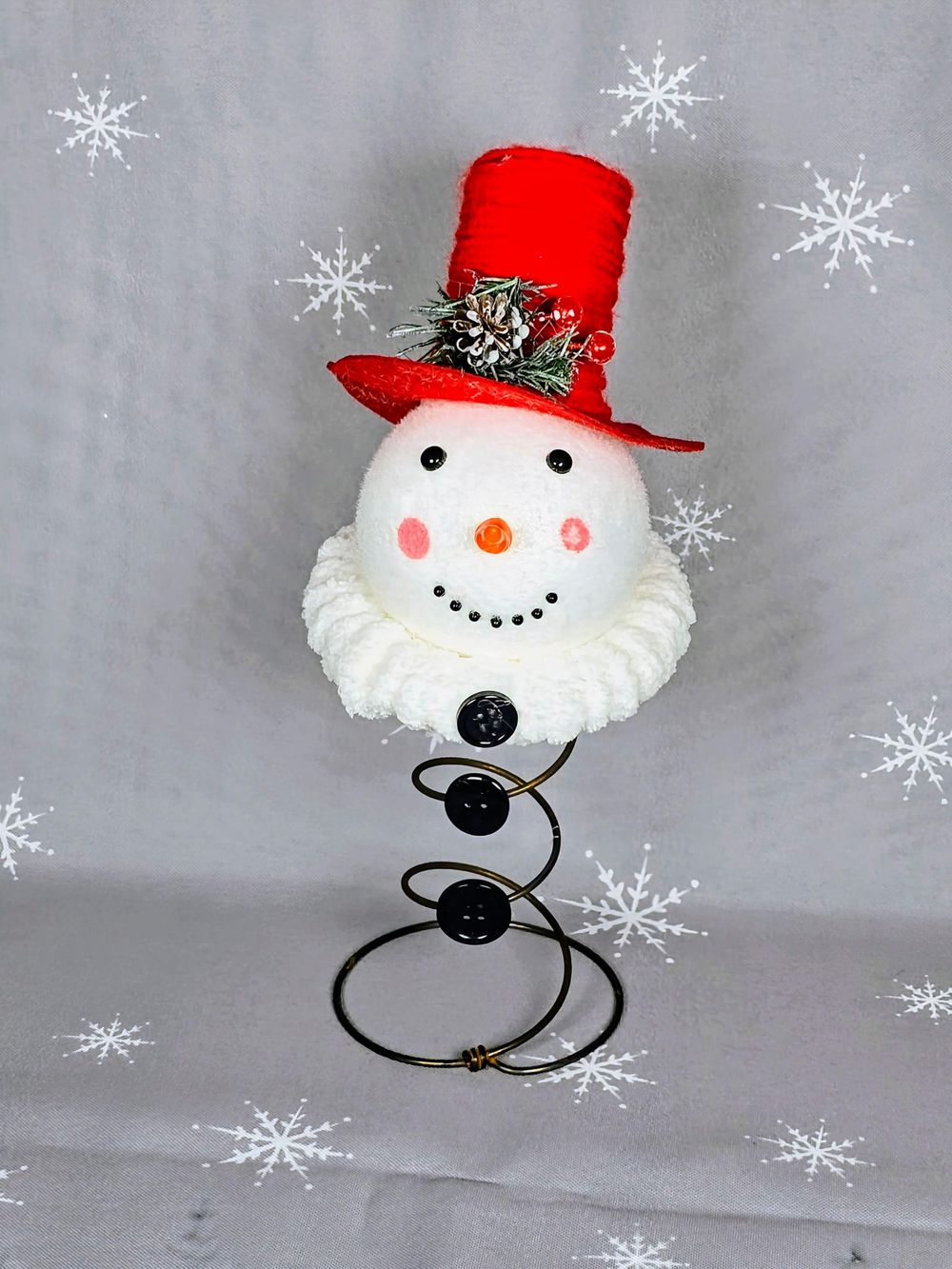 Snowman Christmas Tree Topper – Repurposed Bed Spring, Red Top Hat, Black Buttons, Pinecone & Holly